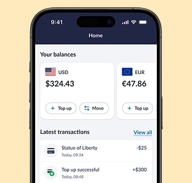 Travelex Money App interface showing balances in USD and EUR with options to top up and move funds. The screen also lists recent transactions and includes a prominent 'Top up' button at the bottom. Navigation tabs for Home, Card, and Profile are visible.